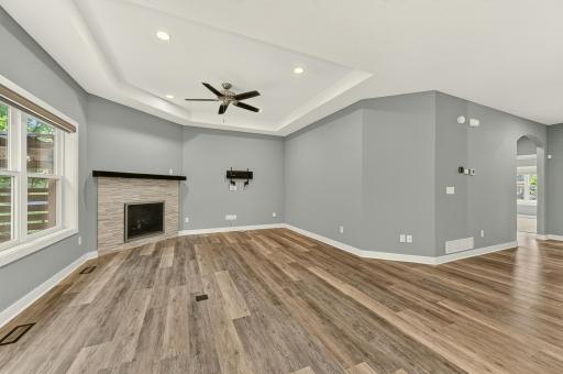 Main Floor living room with cozy fireplace.jpg