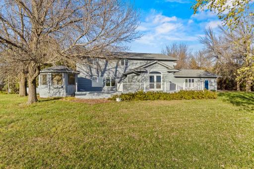 Enjoy peaceful rural living with a sprawling backyard, oversized entertaining spaces, and panoramic views surrounding the property.