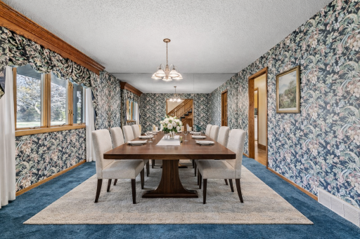 Large formal dining room with abundant natural light and generous space for entertaining, gatherings, and special occasions. virtually staged