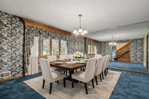 Versatile formal dining room offering generous dimensions and natural lightâperfect for formal entertaining, a home office conversion, or multi-purpose flex space. virtually staged