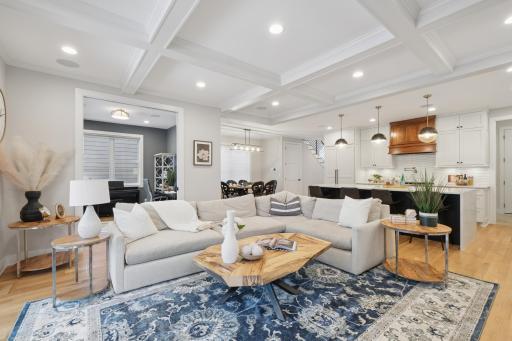 Paneled appliances, custom walnut hood, and refined kitchen finishes.