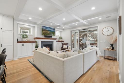 Custom built-in with walnut accents and gas fireplace.