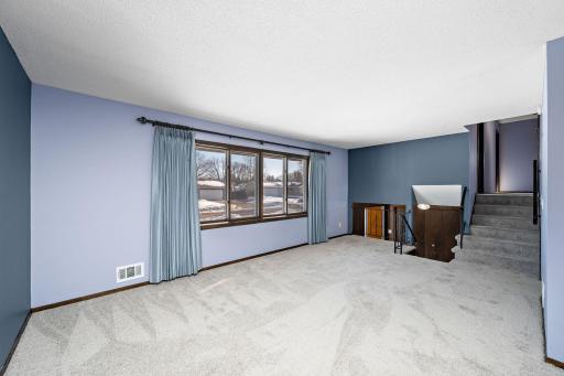 Main level is up a short flight of stairs to the living room.