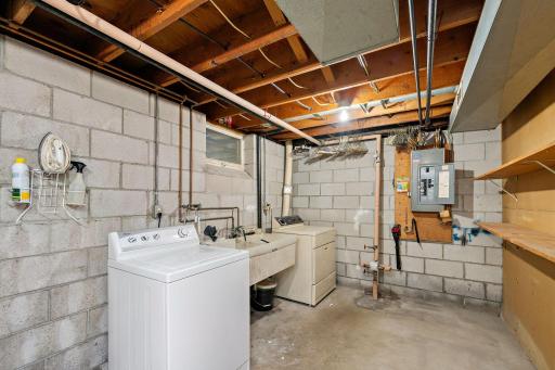 Lower level utility room has everything conveniently located in one area. Furnace, water heater, and softener also in this room.