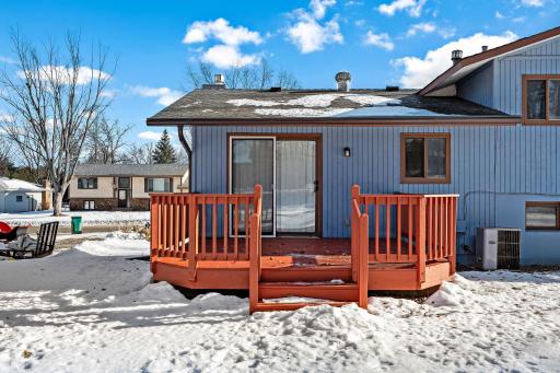 Deck to the backyard is accessed through the dining room.