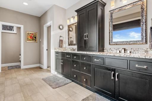 Primary Bathroom with Heated Floors and plumbed for bathtub. (Current Owners did not want a tub)
