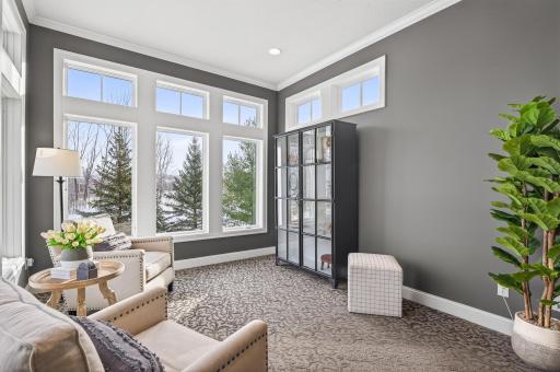 Front den area which is a great piano or reading area. Floor to ceiling windows with great views!