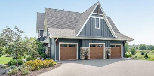 Over-sized 3-car garage with high ceilings, epoxy floor system, and in-floor heat. ~mv2 (1).jpg