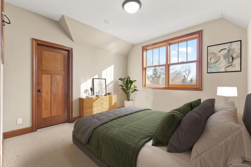 Upper level 5th Bedroom (virtually staged)