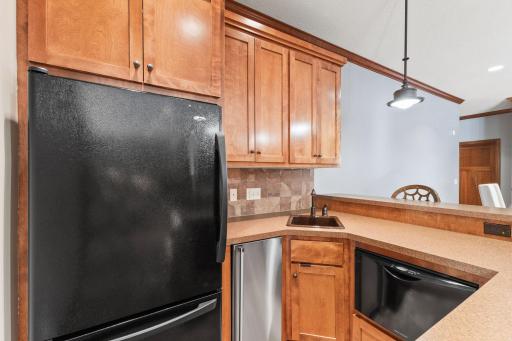 Wet bar has fridge, dishwasher and ice maker for all of your entertaining needs