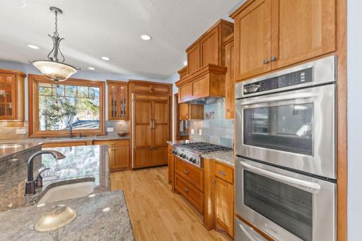 Prep sink in island and double wall oven with warmer for all of your cooking needs!