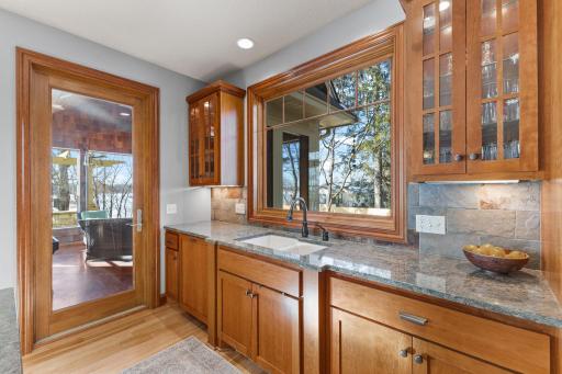 Three season screened porch entrance off kitchen