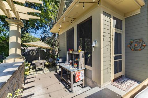 Terrace has room for sitting and dining with access to the three season screened porch!