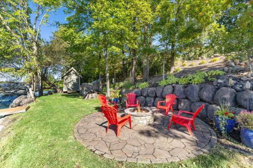 Stained and stamped concrete firepit area for summer and fall nights!