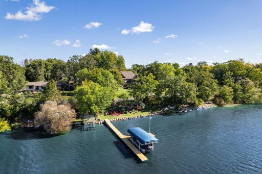 Professionally landscaped lakeshore with irrigation, water and electric!