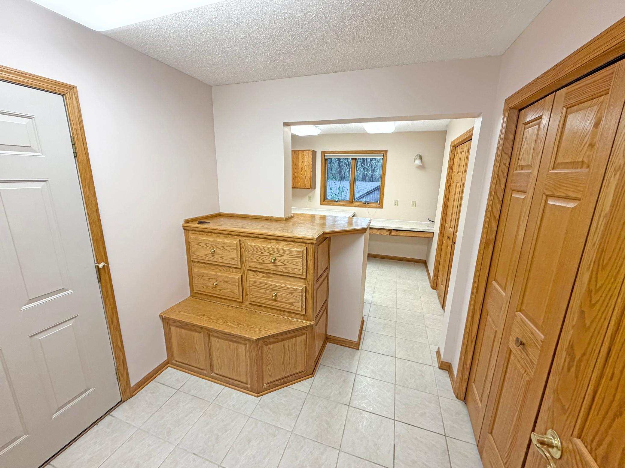Main level garage access and laundry.