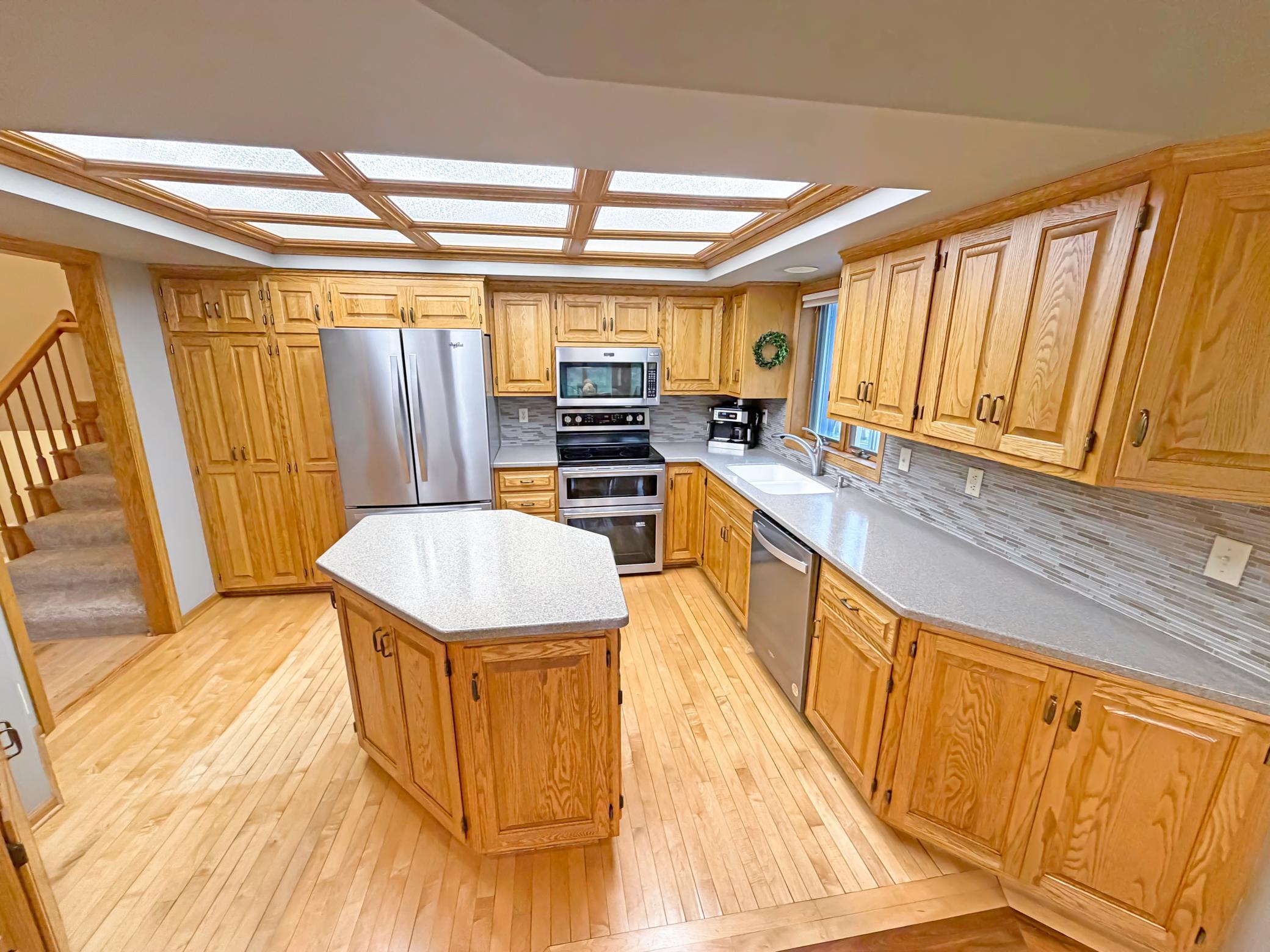 Stainless appliances gleam.