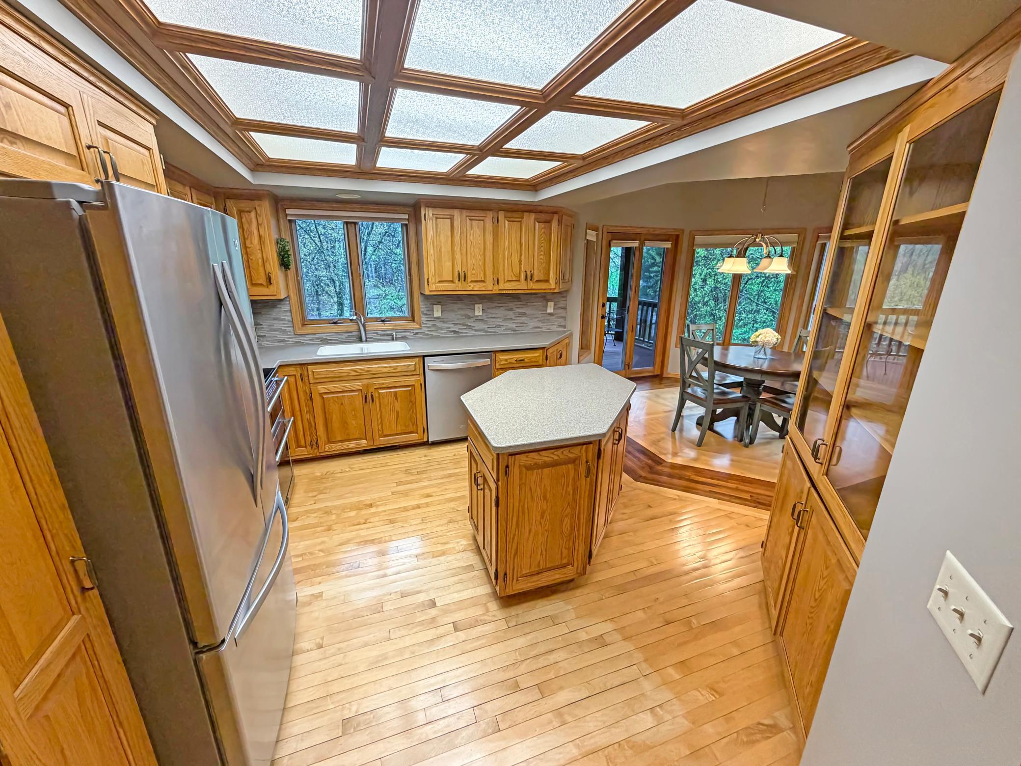 Upper level kitchen with center island and gorgeous views.