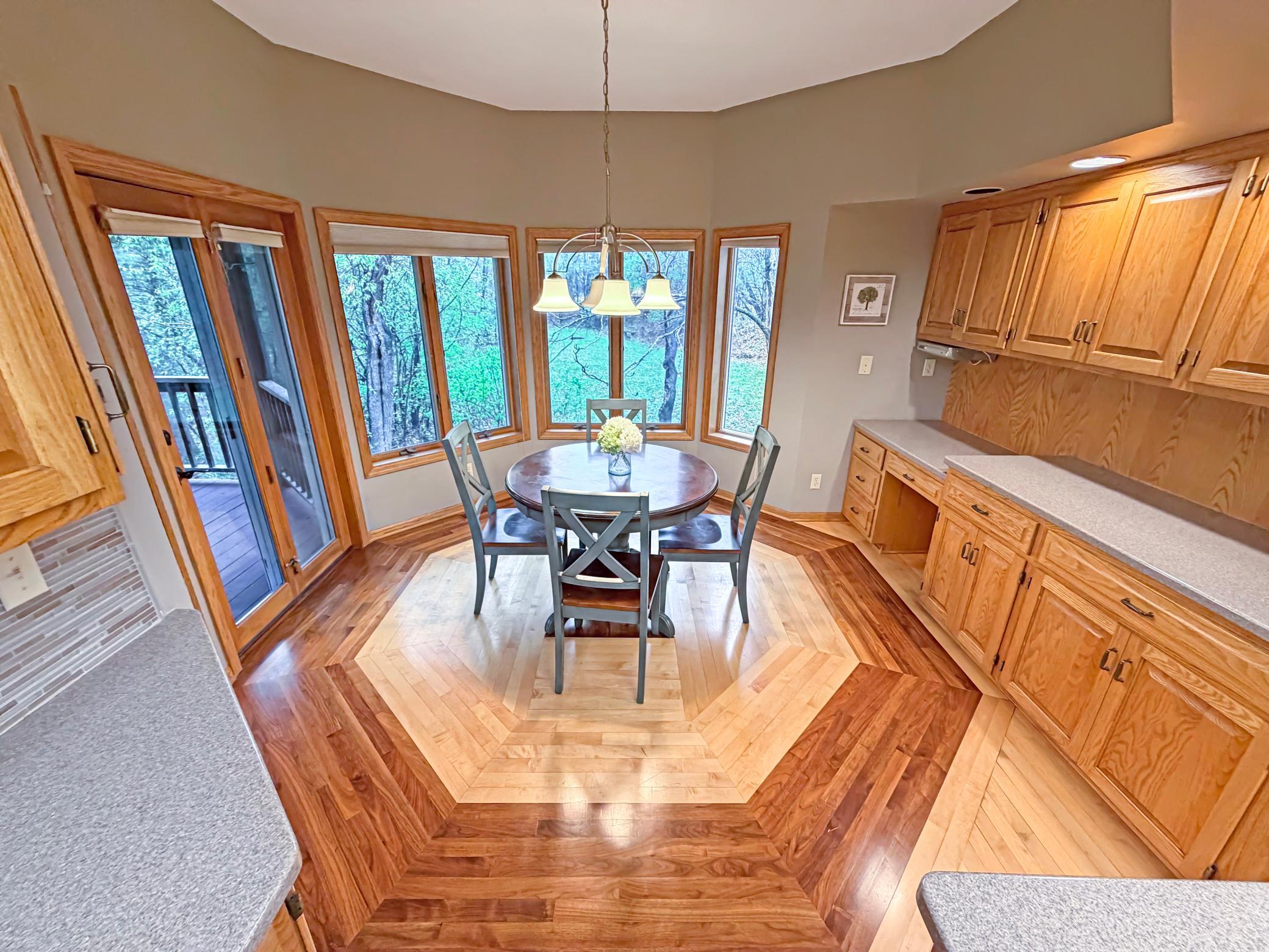 Eat in kitchen / dining area with access to screened porch.