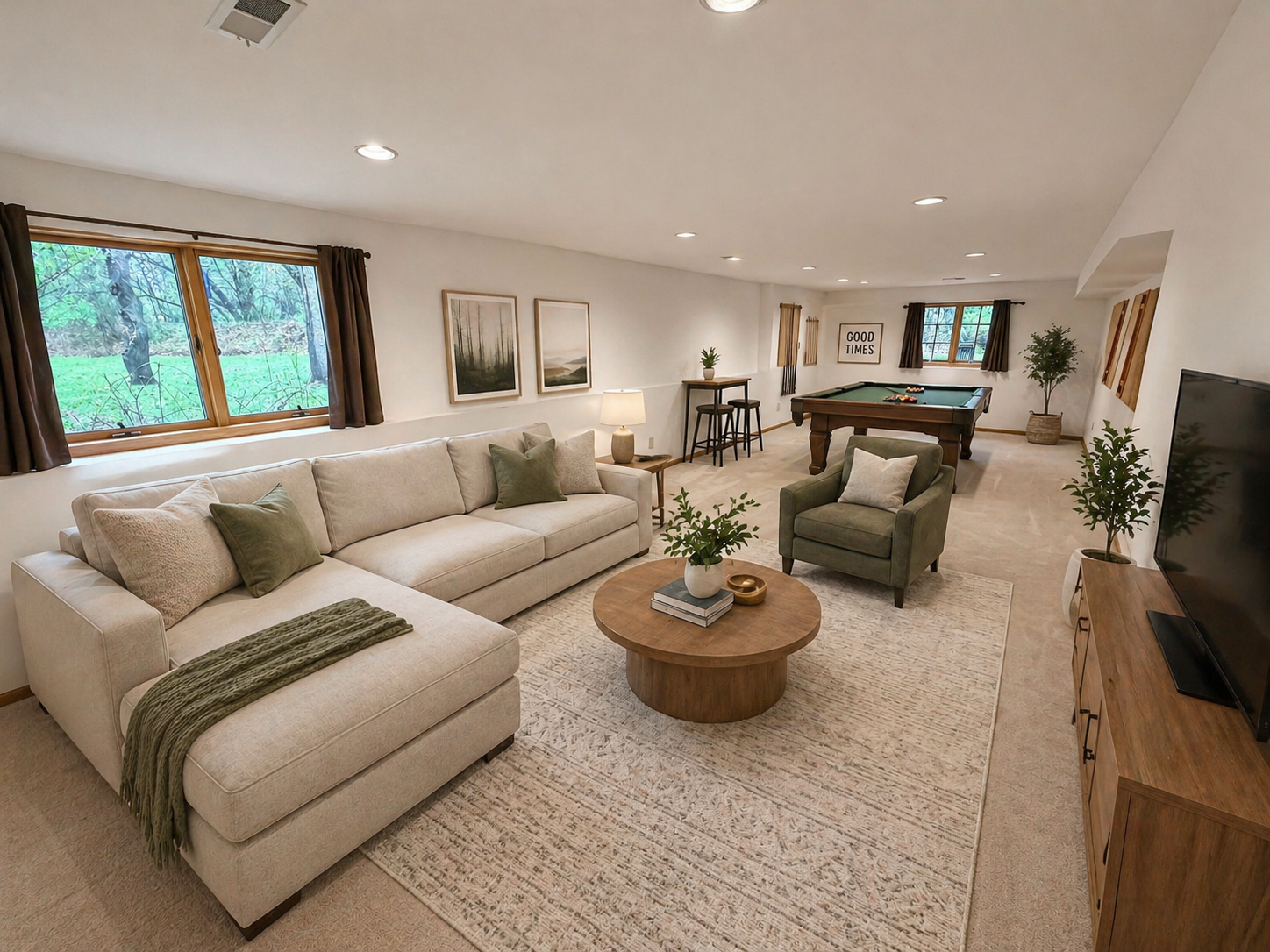 Lower level recreation room for extended living and entertaining space.