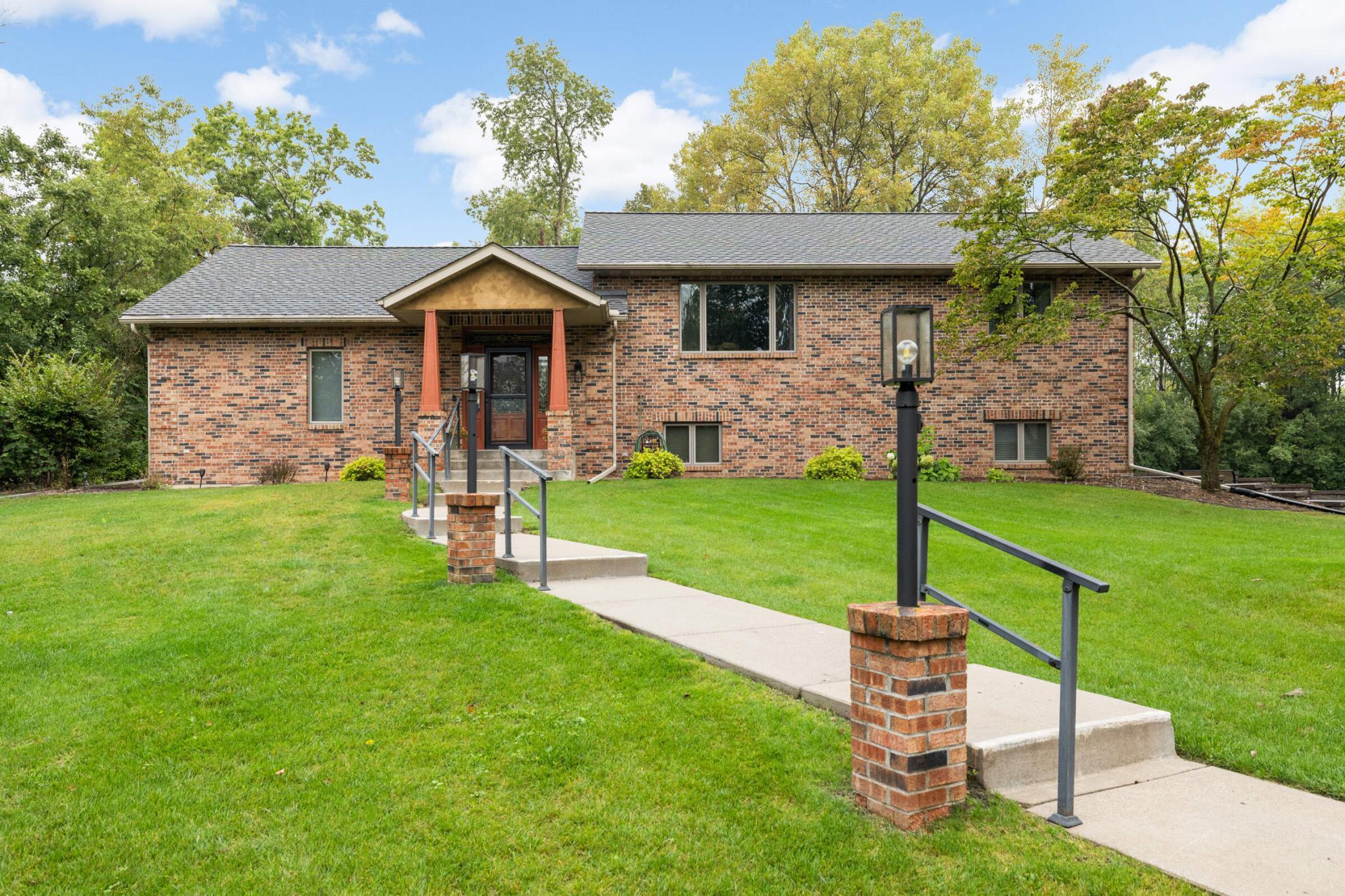 Brick front and sides with great curb appeal and a welcoming entry.