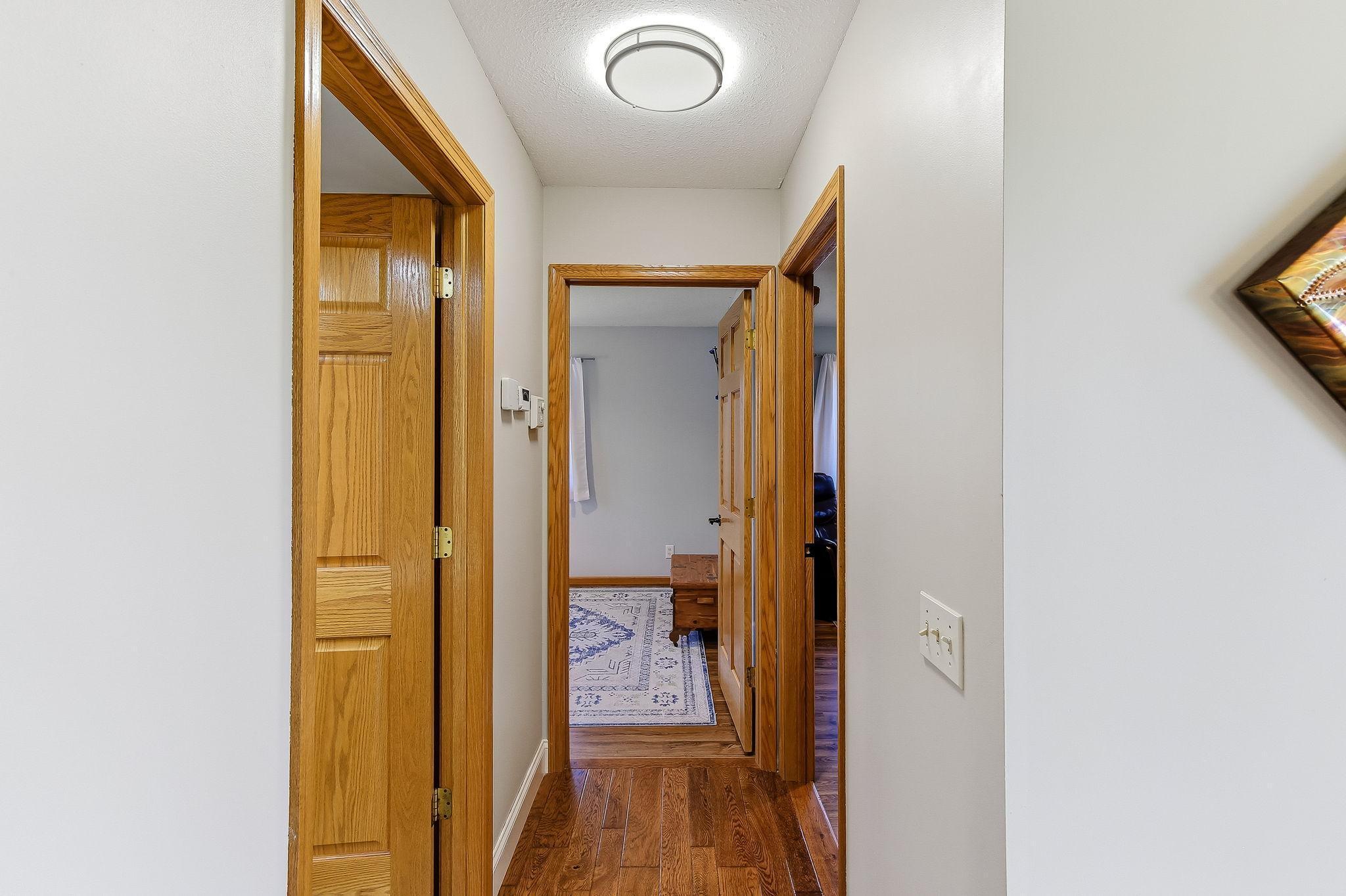 Bright, clean hallway to 2 Bedrooms and bath.