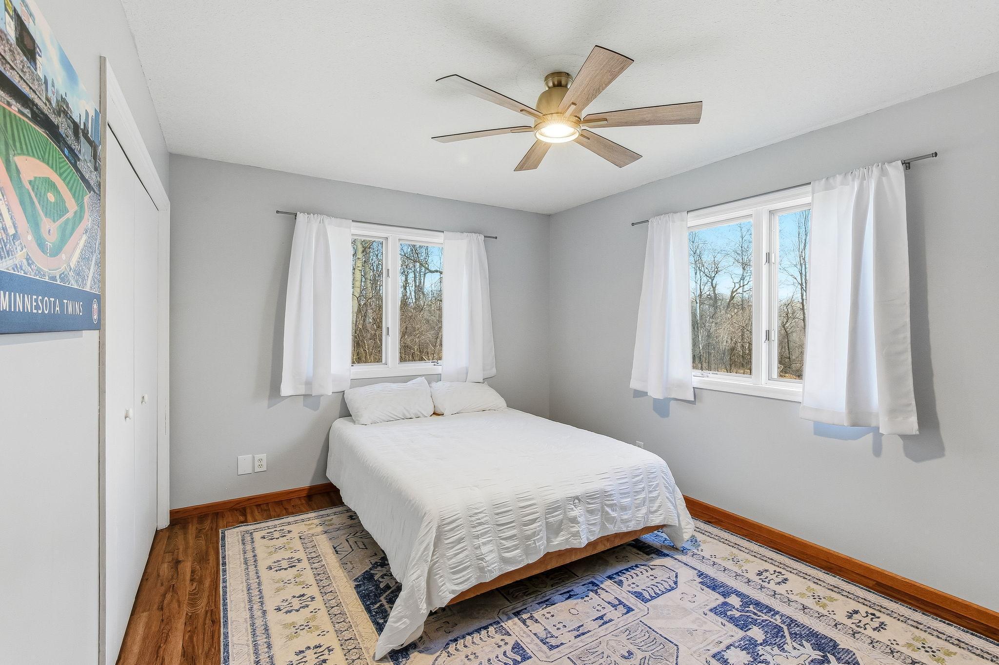 Nice-sized Bedroom with multiple windows, and great natural light.