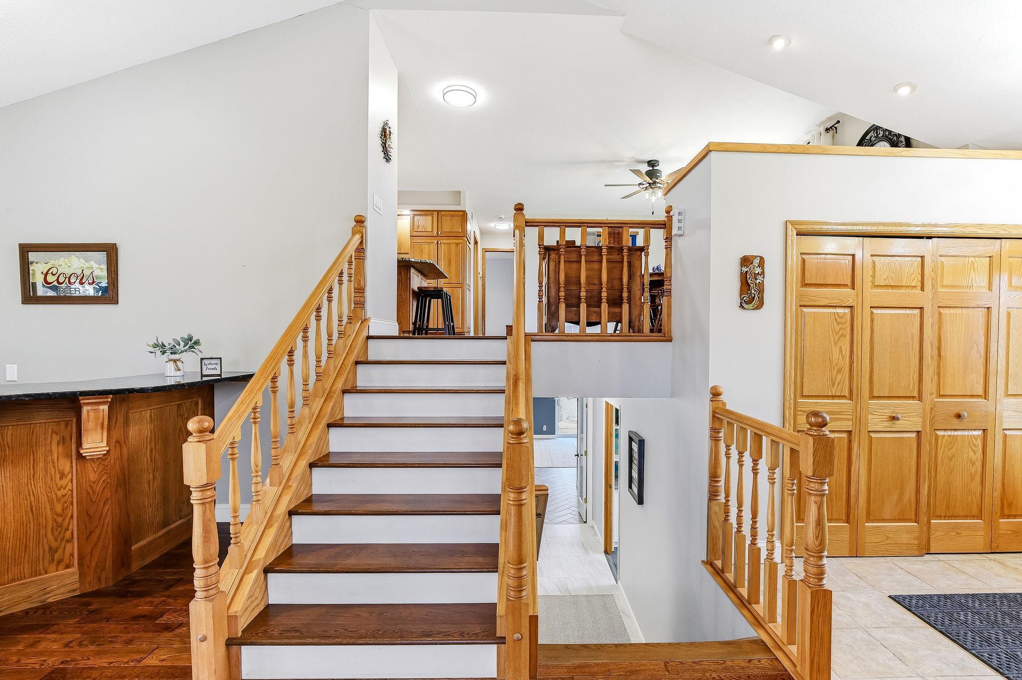 Open staircase design with easy flow between levels.