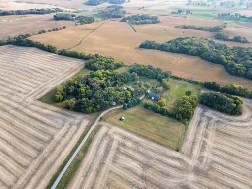 Twelve private acres surrounded by open fields, offering total seclusion and the opportunity for off-grid living.