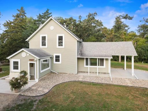Additional sunroom on the north side of the home with windows on all sides—enjoy panoramic views of the property where deer and turkeys are frequent visitors.