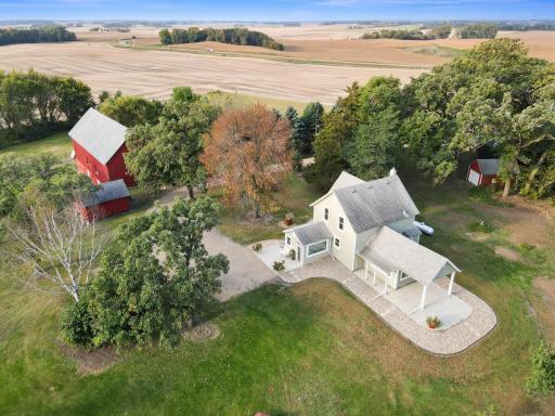 Outside you’ll find grapevines, mulberries, blueberries, and more—plus plenty of space for large gardens.