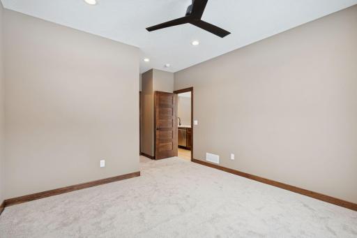 Spacious Owner's Suite with walk in closet and private bath.