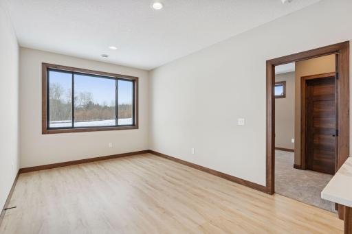 Owner's suite is just off the informal dining area.