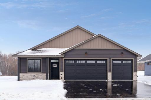 Welcome to 619 7th Ave NE in Isanti! Our most popular single level plan with a 3 STALL GARAGE! NO HOA!