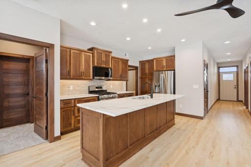 Spacious center island with breakfast seating.