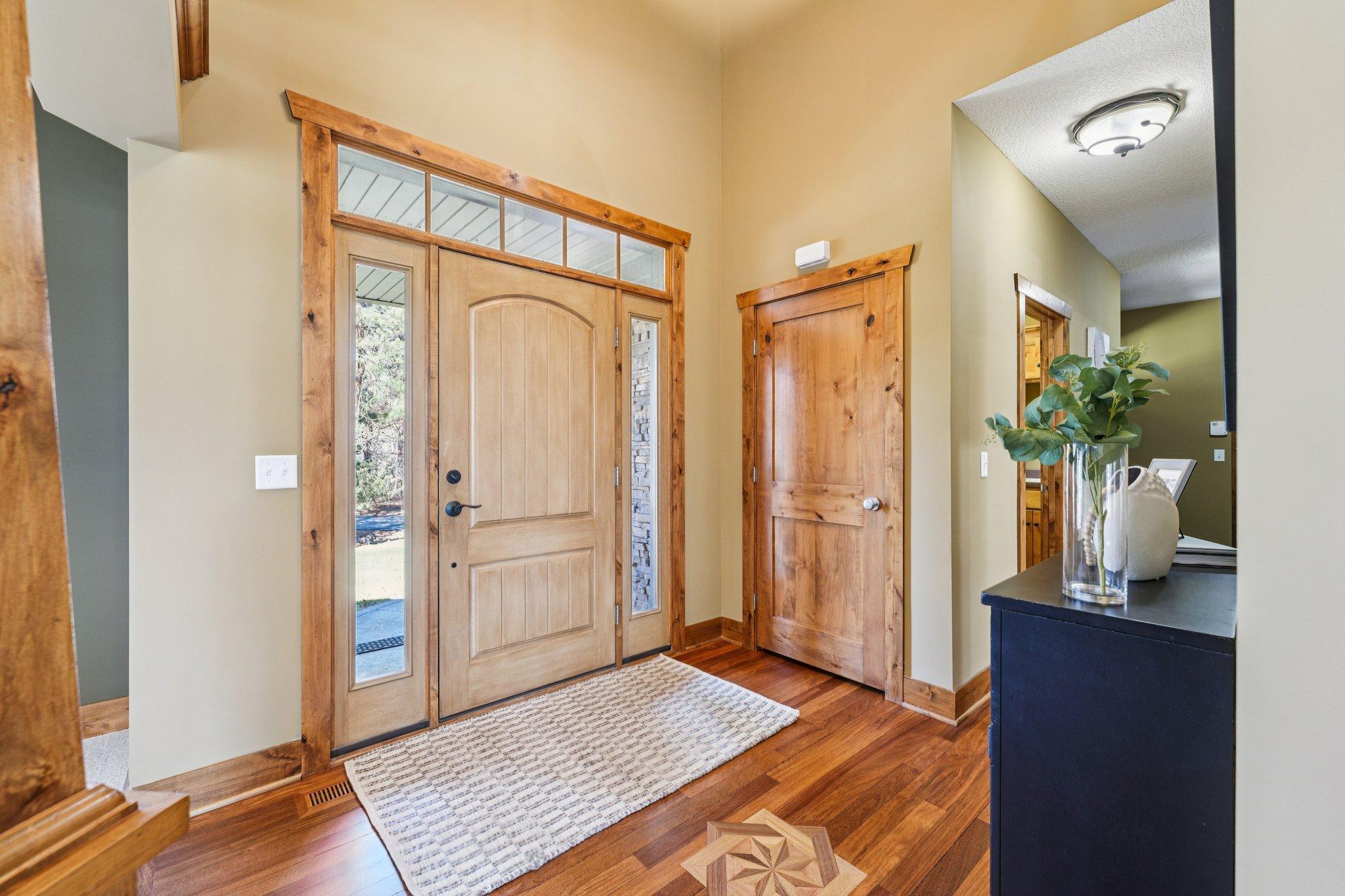 Its a stunner from the moment you walk in. Notice the inlays into the cherrywood floors.