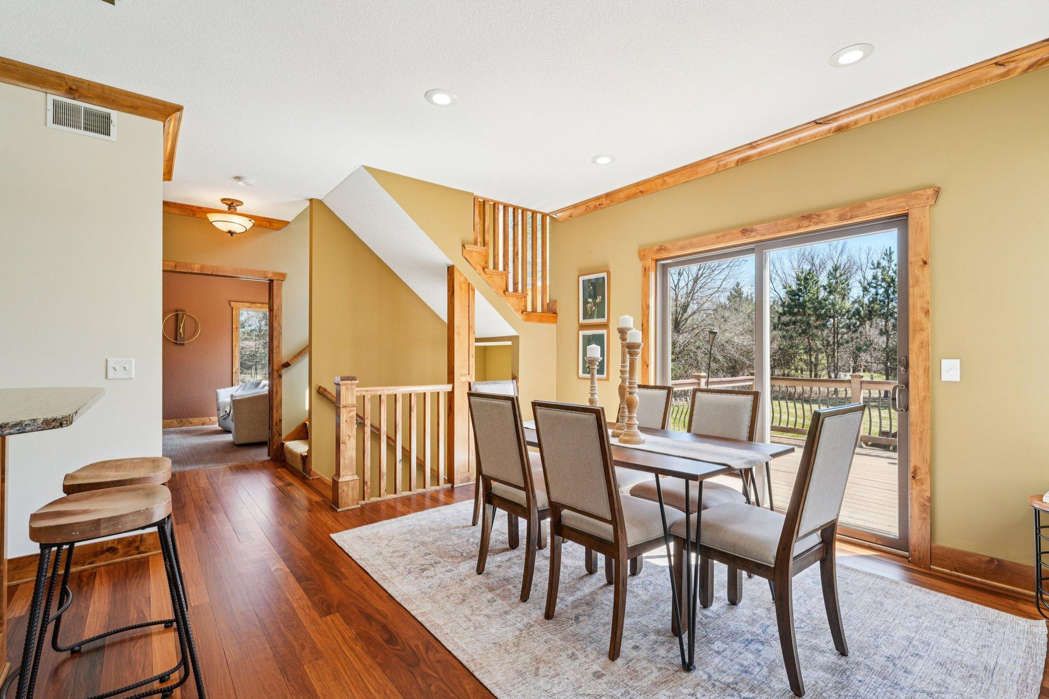 Main floor office visible through the kitchen and informal dining area.