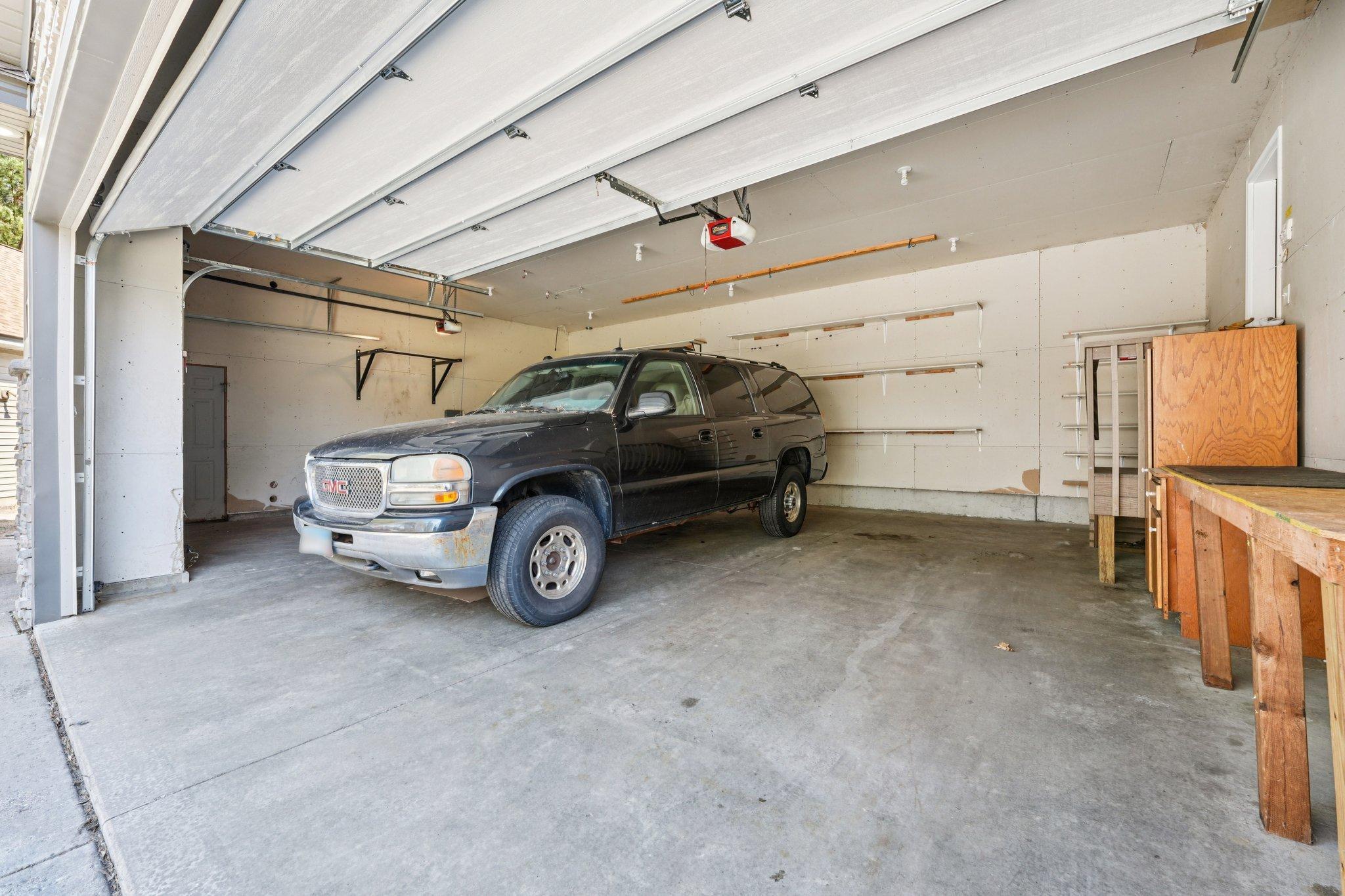 Detached oversized 2 car garage. Notice the space even with a suburban!