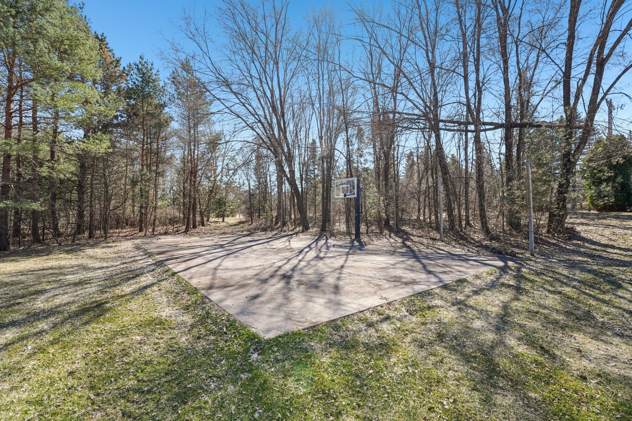 Full sized sport/court concrete pads provides options for kids, a parking spot for your RV or toys and more!