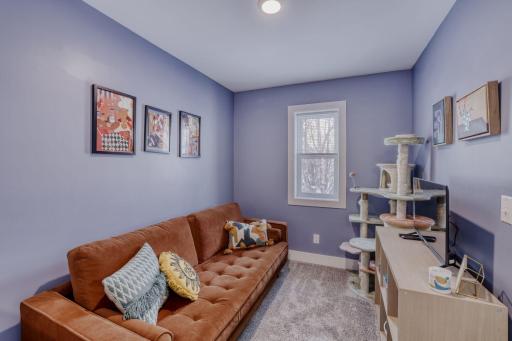 This upper level room could be used as a gaming space, a yoga / exercise space, or an additional lounge area.