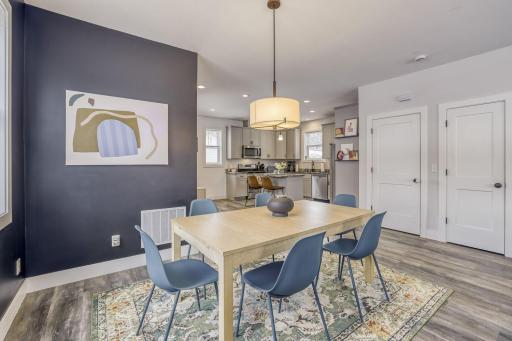 Across from the dining room is a generous sized coat closet and the door to the lower level.