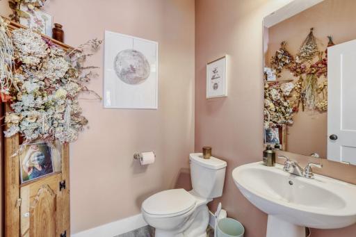 This powder room is located just off the mudroom on the main floor, convenient for all of your guests.