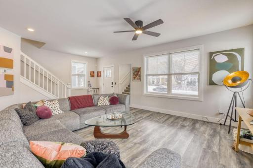 The living room is flooded with natural light.