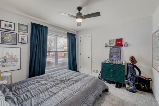 The second bedroom has a large window and also a walk in closet.