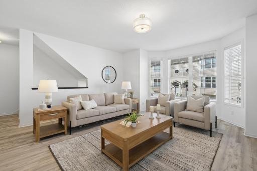 Updated light fixture and low maintenance Luxury vinyl plank flooring