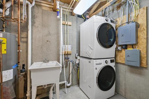 Front load washer and dryer and utility sink