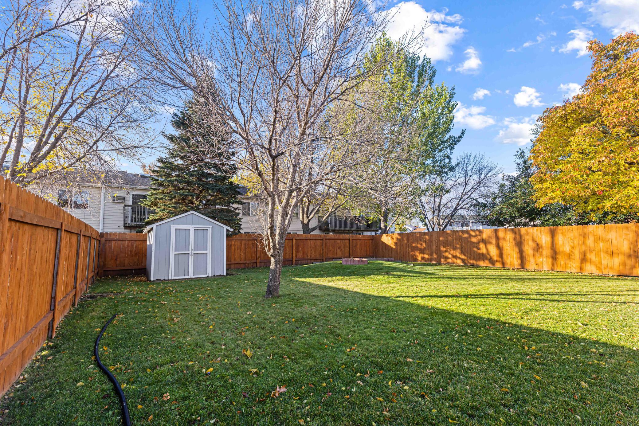 Fenced Yard w/ Storage Shed