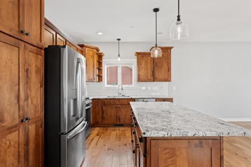Tiled backsplash with under cabinet lighting