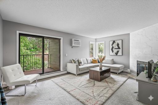Large living room with tiled fire place- virtually staged