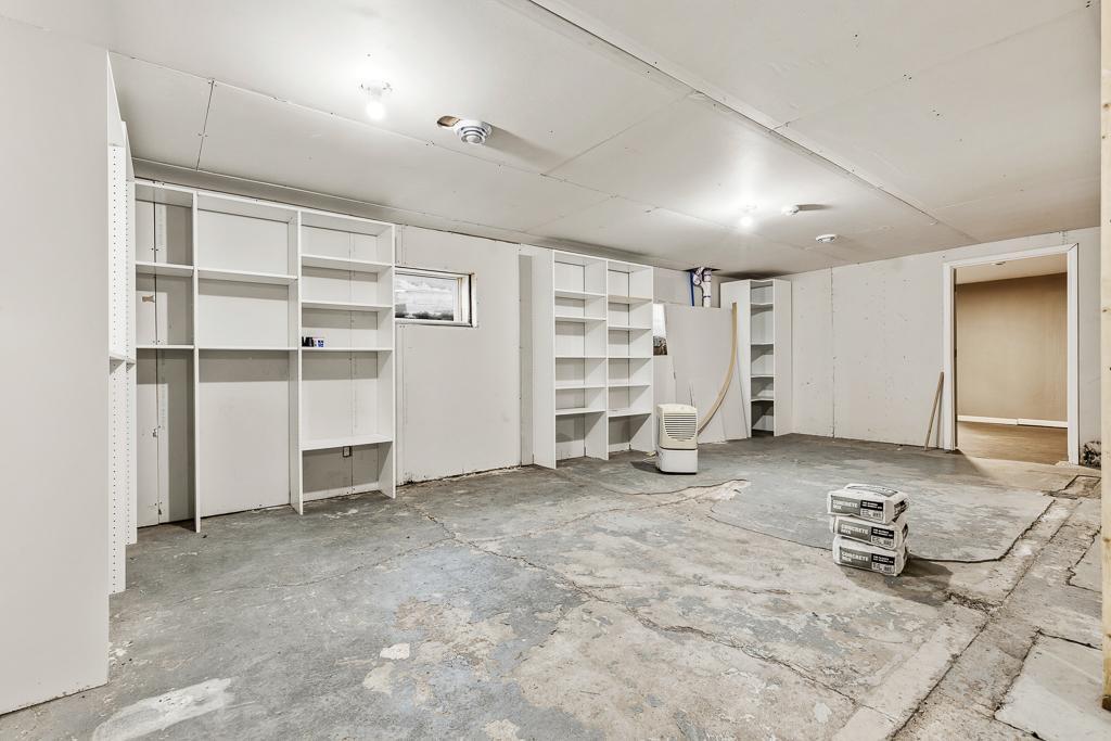 Plenty of room for storage or to finish a family room